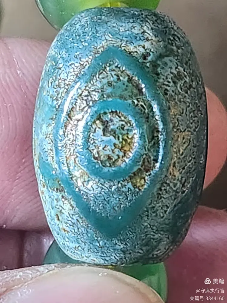 宋代北辽老玉三眼绿玛瑙天珠寓意